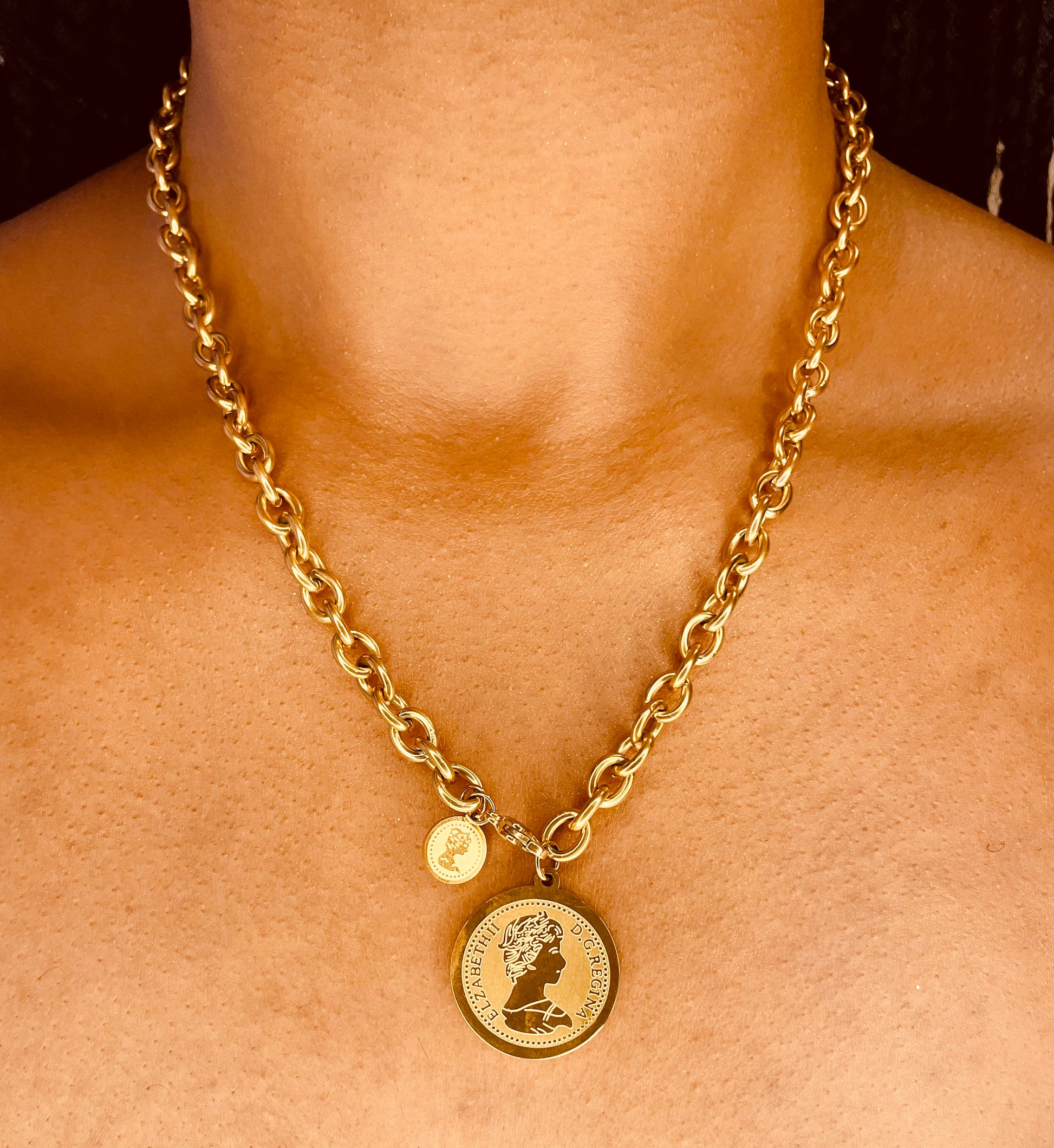Stylish 18K gold plated coin necklace worn by a model, highlighting its chic design from GeorgiaReneeBoutique.