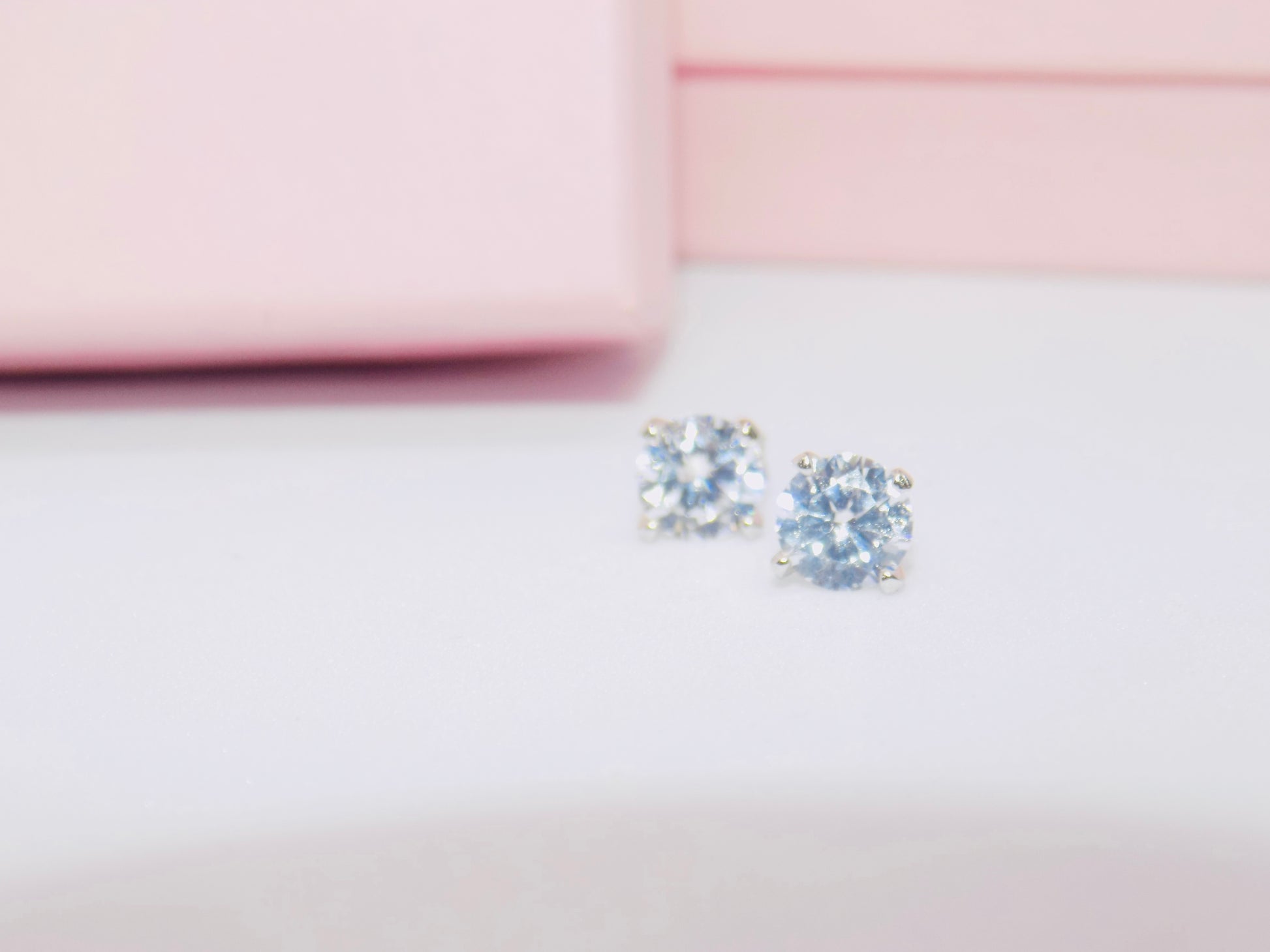 925 sterling silver cubic zirconia minimalist stud earrings highlighting their chic simplicity from GeorgiaReneeBoutique.