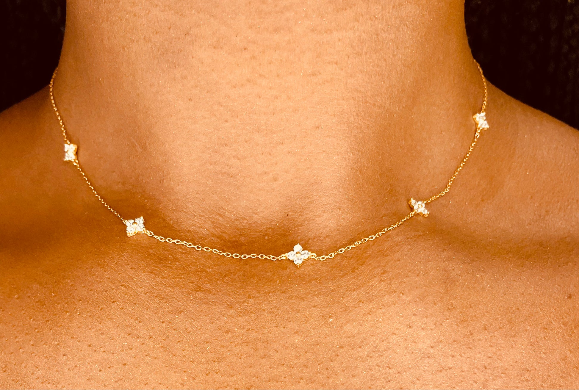 “18k gold plated sterling silver four leaf clover pendant necklace worn on model | Georgia Renee Boutique”