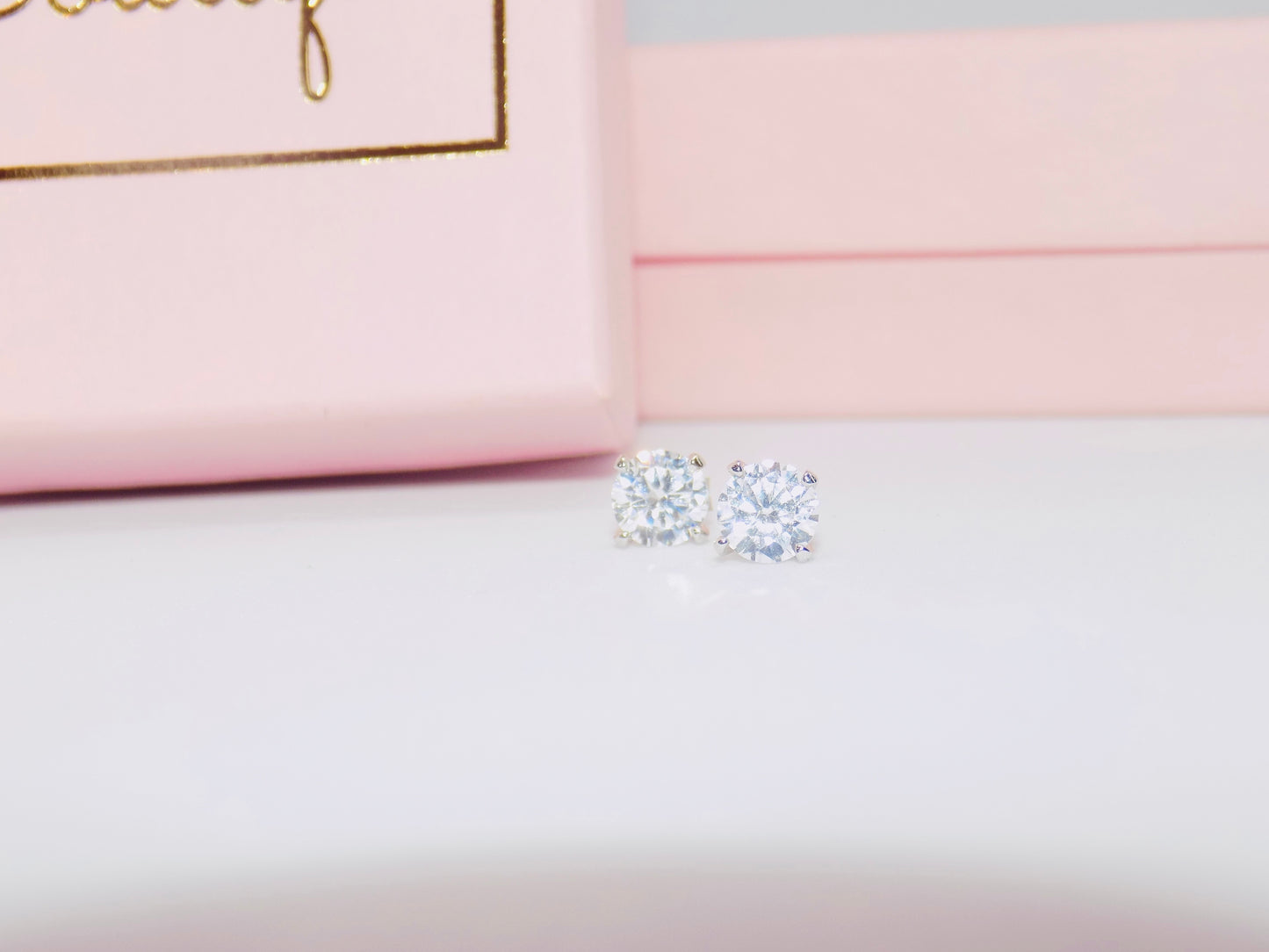Close-up of tarnish-proof 925 sterling silver cubic zirconia stud earrings with a sleek geometric design for timeless style.