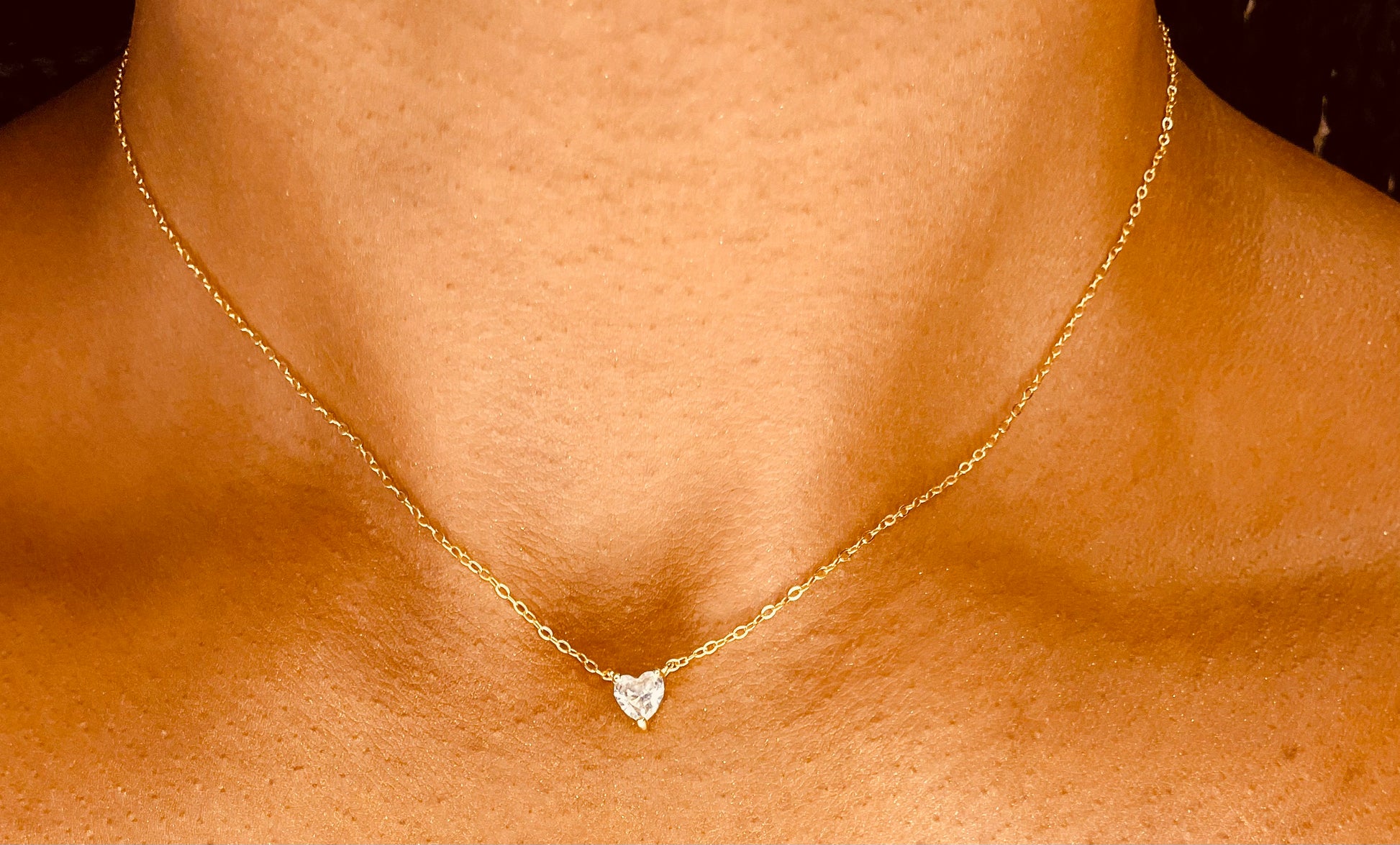 view of tarnish-proof dainty heart 18K gold plated necklace, featuring a delicate chain and elegant heart pendant.