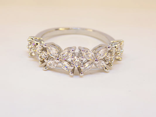 Elegant Lorelei ring in 925 sterling silver with floral prong eternity band design, featuring sparkling cubic zirconia.