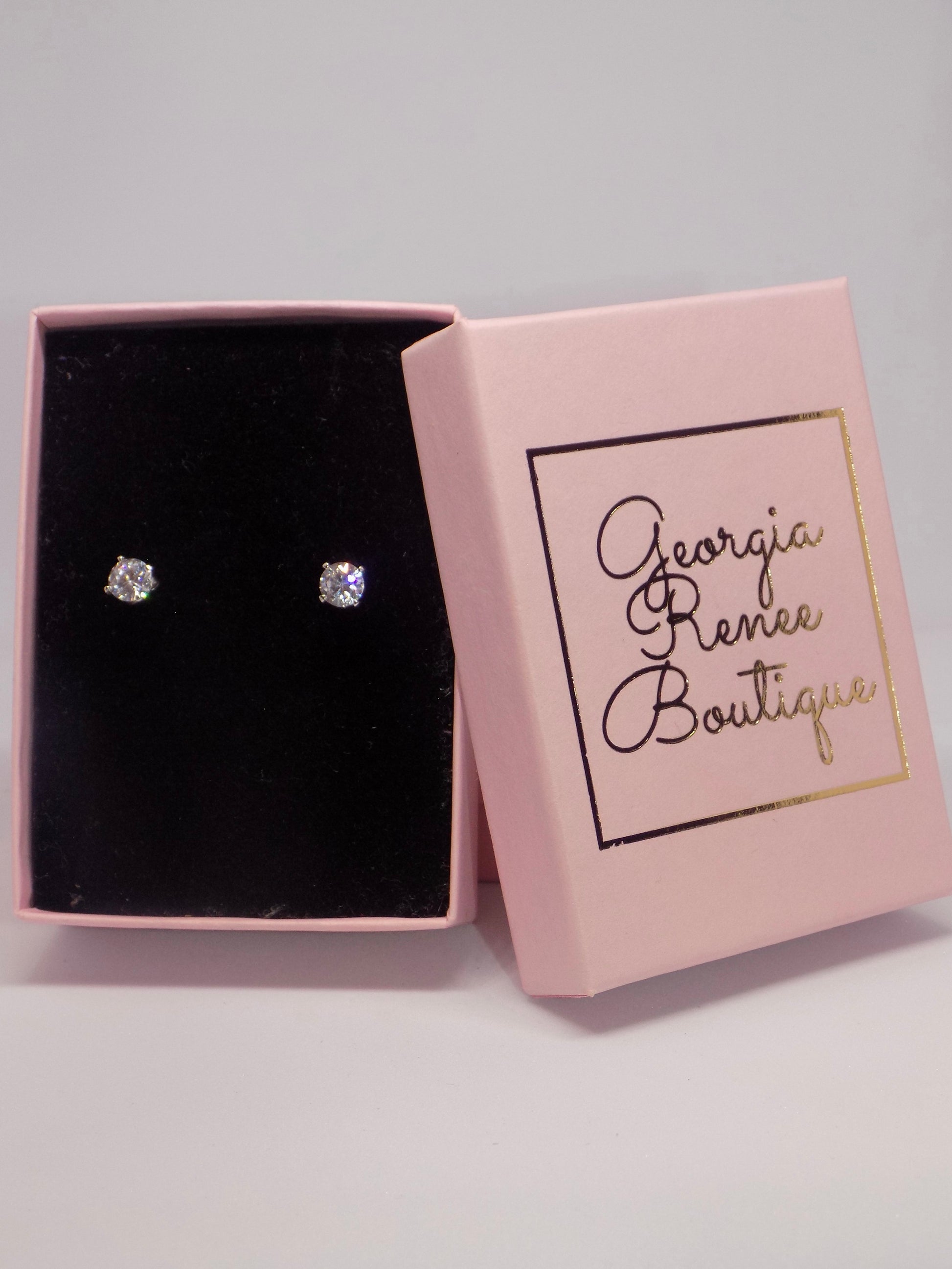 Handmade 925 sterling silver cubic zirconia geometric stud earrings in premium gift packaging, perfect for special occasions.