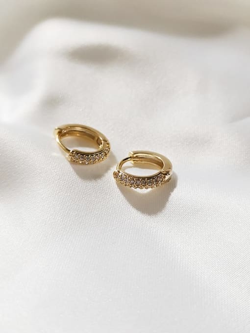 Handmade 14K gold plated geometric minimalist huggie earrings with sparkling cubic zirconia, perfect for elegant style.