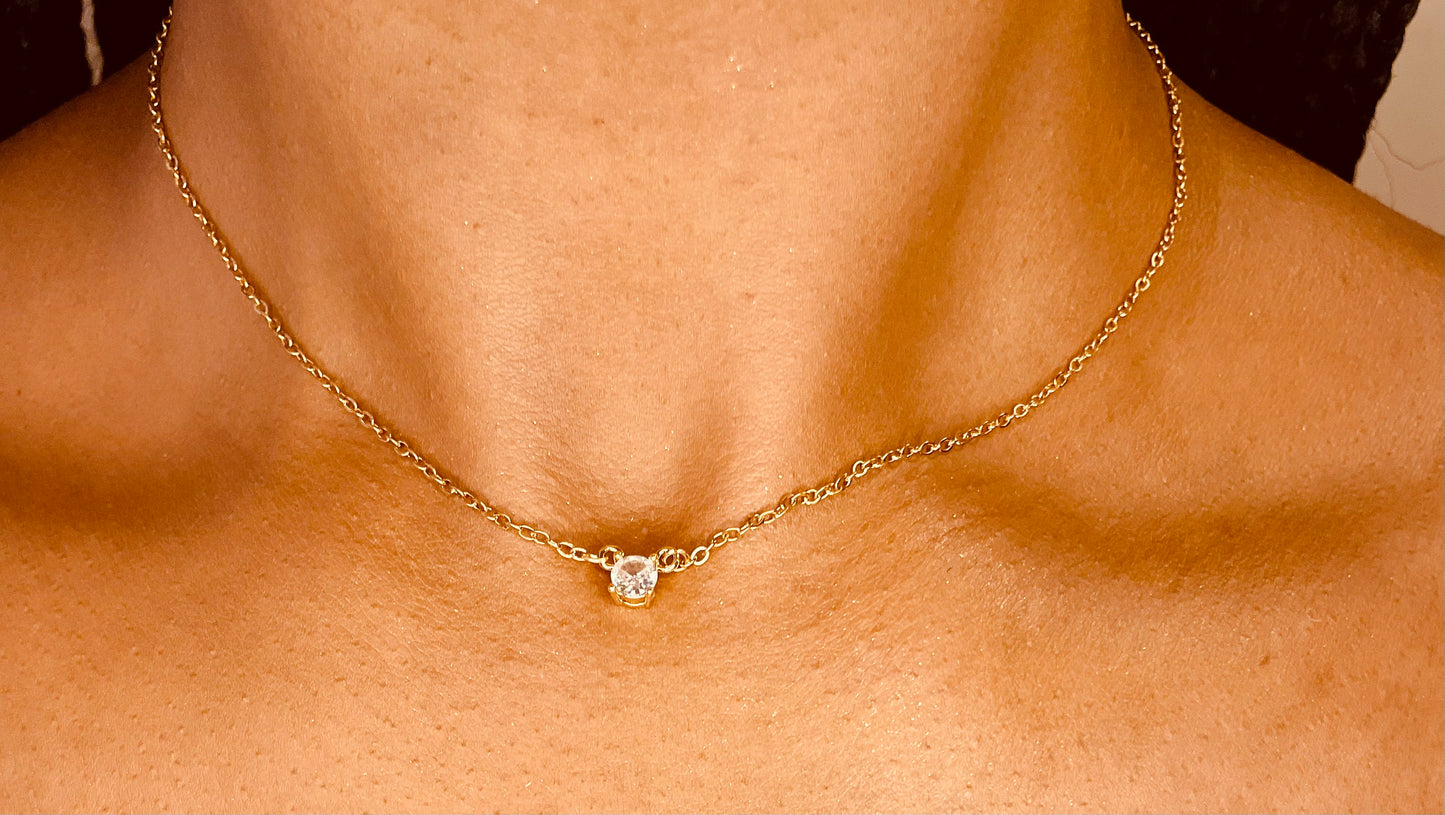 Stylish 18K gold plated steel necklace worn by a model, highlighting its chic design from GeorgiaReneeBoutique.