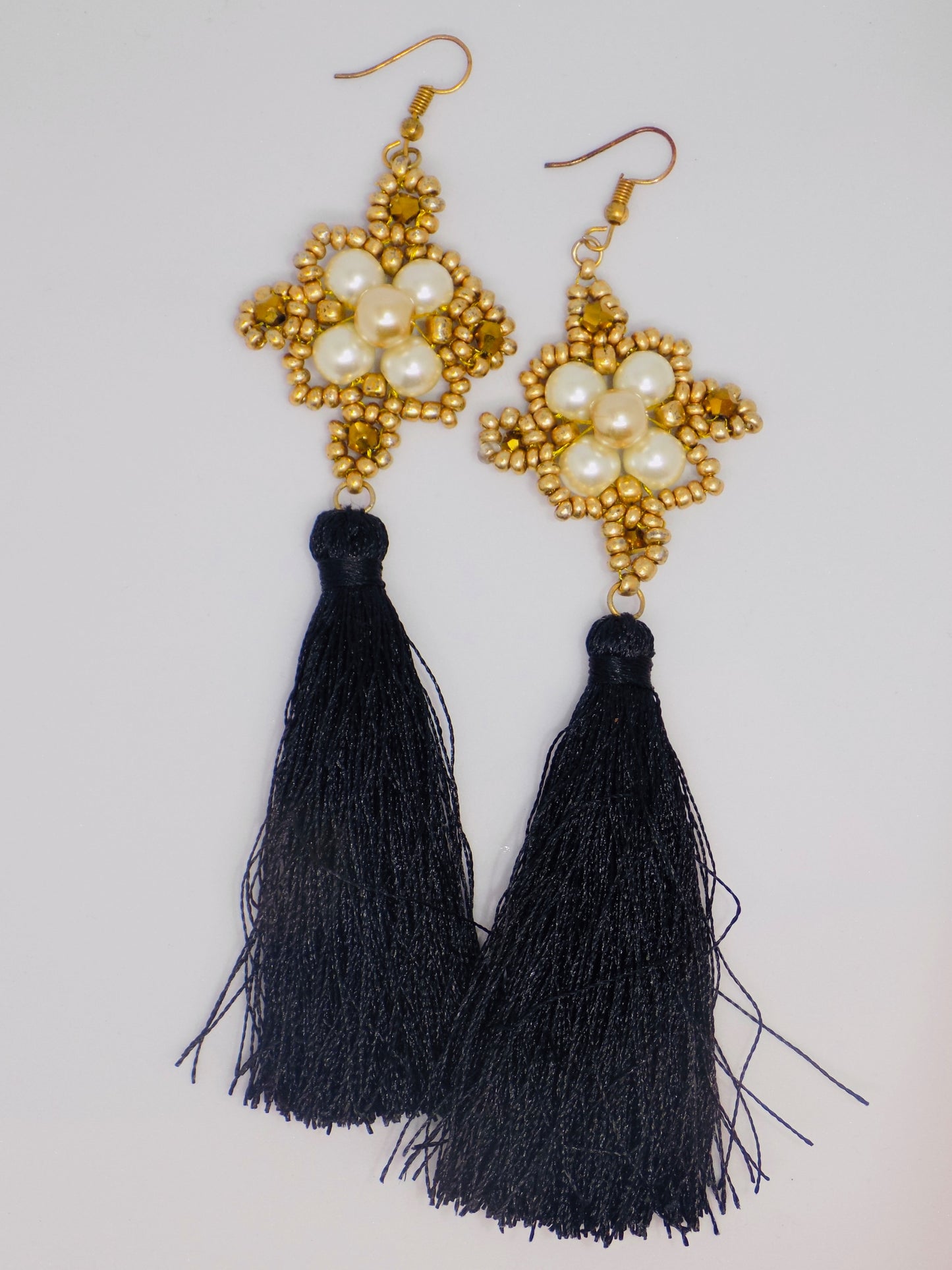 Close-up of the Nova tarnish-proof 18K gold plated necklace, showcasing intricate details and lasting shine.



