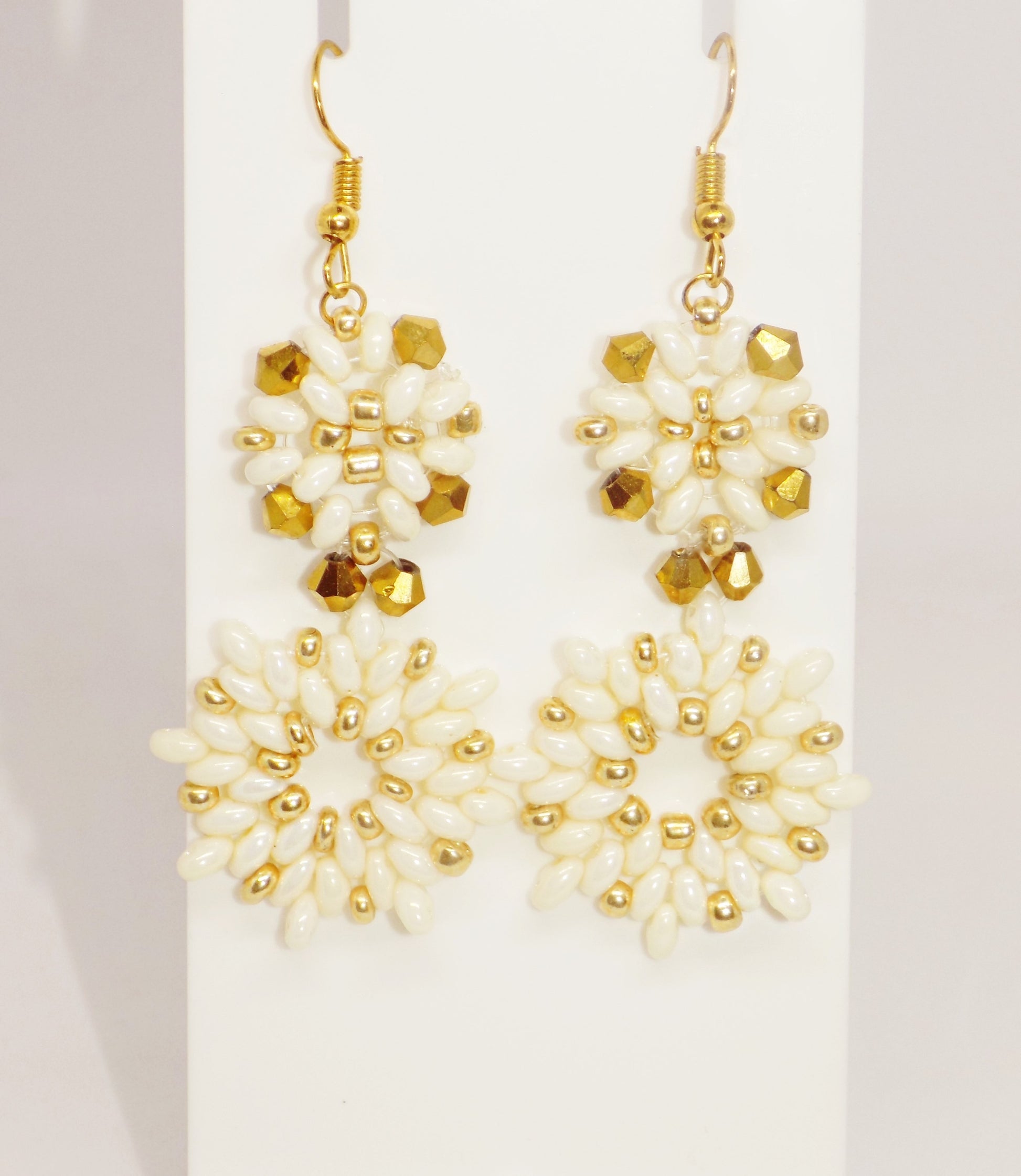  Handmade Valentina 18K gold plated chandelier earrings with delicate beading and faceted crystals for bridal elegance.